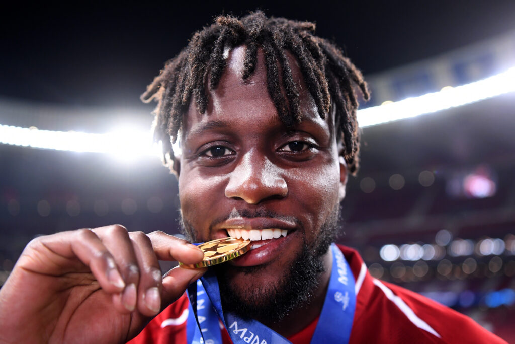 Divock Origi celebrates after winning the UEFA Champions League